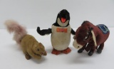 Three wind up toys, penguin, donkey and squirrel