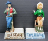 Two Jim Beam Western bottle holders, 13