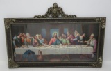 Ornately framed and brightly colored print of Lords Supper