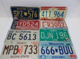 Eight 70's and 80's US license plates, PA, two IL, NE, MN, MI, IA, HI