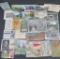 Ephemera lot with postcards, revenue stamps, and 3 Famous men BAS Relief stamps