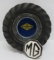 Vintage Good Year tire ashtray and MG auto emblem