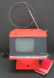 1970's Sharp Television set with stand, tangerine, model 3S-111, Space Age look