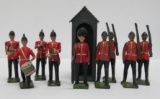 Nine British Britains metal toy soldiers and 3 1/4
