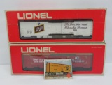 Two Lionel advertising train cars with boxes, Schlitz and Old Milwaukee