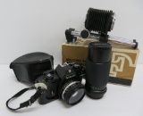 Nikon 35 mm camera, lens and bellows attachment