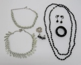 Vintage jewelry lot with black glass, sterling pin and silvertone necklaces