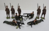 Nine metal toy soldiers, Britains