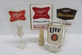 Four vintage Miller beer tapper handles, lucite style and metal