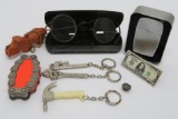 Lighters, key chains, dog flashlight and antique glasses