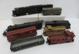 Eight HO train cars and engins