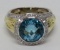 Beautiful 18 kt gold ladies blue topaz and diamond ring, size 9