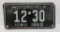 1960 Iowa motorcycle license plate, black and white, 7 1/2