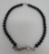 Mid Century Modern influenced panther necklace with black glass beads