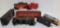Seven plastic train cars, Lionel and Cat