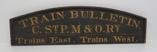 Outstanding original paint Train Bulletin wood sign for C, StP M & O railway, 33" x 9 1/2"