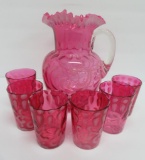 Cranberry Daisy and Fern pattern fluted pitcher and six tumblers