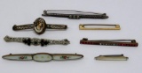 Seven vintage bar pins, rhinestones, cameo.MOP, and enamel, 1