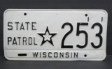 Wisconsin State Patrol license plate, flower inside star, white and black, 12