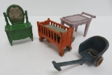 Four Cast iron doll house miniatures, 3