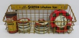 Scotch tape display and 10 assorted tins