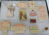 Early paper Cracker Jack toys and doll