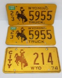 Three Wyoming license plates, pair of matching truck plates and City plate, 12
