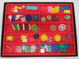 About 73 Cracker Jack toy prizes, plastic, tops-whistles, ID tags, and viewers