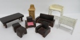 Nine pieces of wooden and designerl doll house furniture