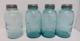 Four 1/2 gallon blue canning jars with zinc lids, Ball and Atlas