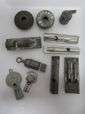 11 metal whistles, attributed to Cracker Jack prizes a few marked