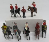 9 mounted metal toy soldiers, mounties and knights