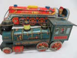 Two battery operated Modern Toys train engines, tin litho, 13