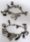 Two charm bracelets, some marked sterling