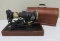Singer portable sewing machine with wood carrying case