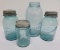Four blue canning jars