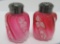 Cranberry glass salt and pepper shakers, swirl glass patterned and hand painted floral, 2 1/2