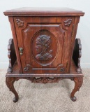 Ornate magazine rack, smoking stand with portrait door