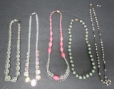 Four glass bead necklaces, 15