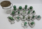 17 vintage green handle cookie cutters and vintage jar