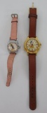 Two Mickey Mouse wrist watches