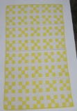 Yellow and white patchwork quilt, 32