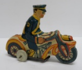 Louis Marx tin litho motorcycle toy, 4 1/2