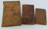 Three early leather bound books