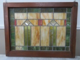 Arts and Crafts leaded glass window in wooden frame, 32