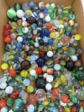 About 500 machine made marbles, shooters and standard