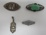 Three ornate reticulated pins and pendant