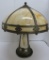 Antique caramel slag glass lamp with ornate metal overlay, 23