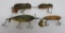 Four vintage fishing lures, three wooden