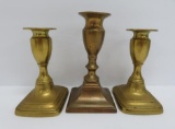 Three early brass candlesticks, push ups, 4 1/2